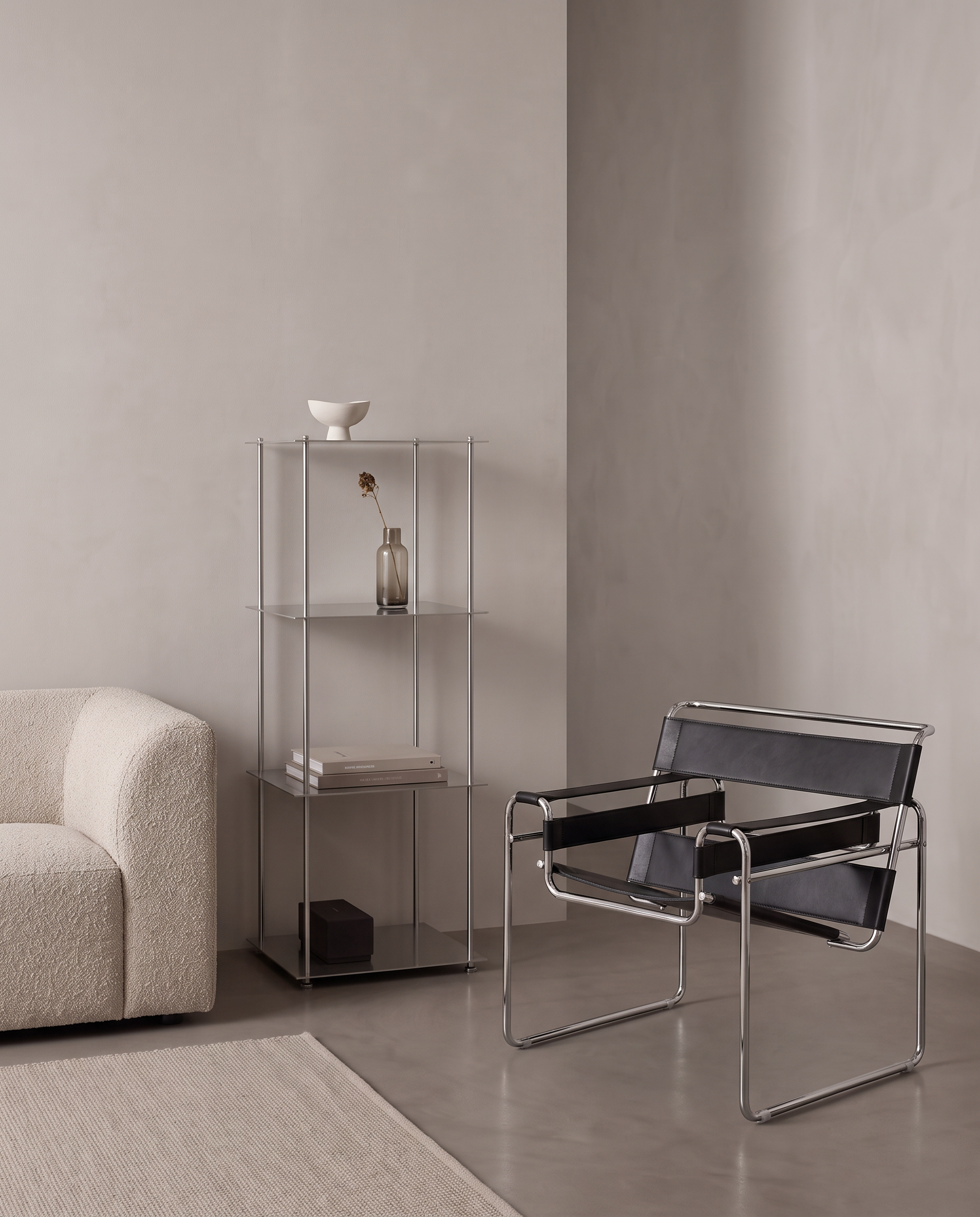 The So So Shelf, a chrome and glass tiered shelving unit
